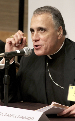 Cardinal Daniel DiNardo of Galveston-Houston at a 2011 press conference (CNS/Reuters/Marcus Donner)