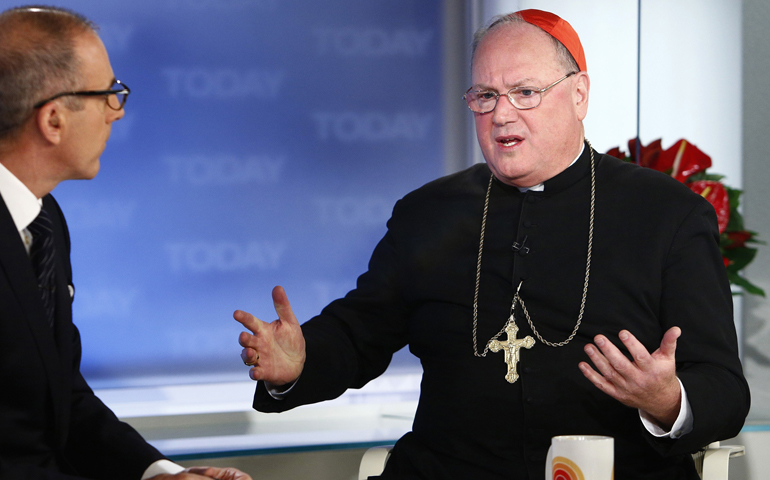 Matt Lauer and New York Cardinal Timothy Dolan appear on NBC's "Today" show in New York in this handout photo taken Monday. (CNS/Reuters/NBC/Peter Kramer)