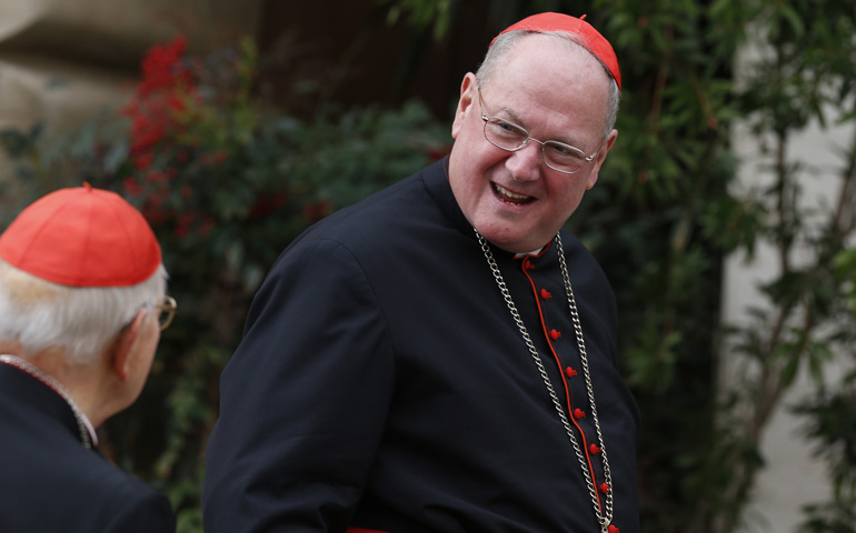 Cardinal Timothy Dolan of New York arrives for a March 8 general congregation meeting in the synod hall at the Vatican. (CNS/Paul Haring)