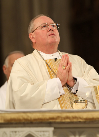 Cardinal Timothy Dolan prays during Mass May 2 at St. Patrick's Cathedral in New York. (CNS/Gregory A. Shemitz) 