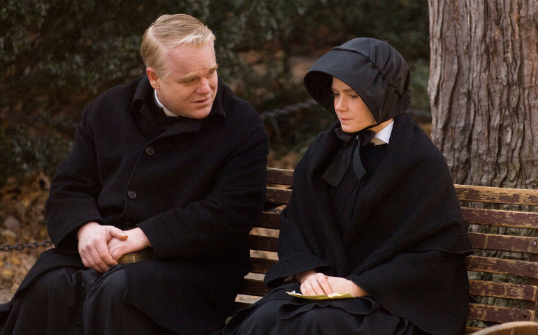 Philip Seymour Hoffman and Amy Adams star in a scene from the movie "Doubt." (CNS/Miramax)