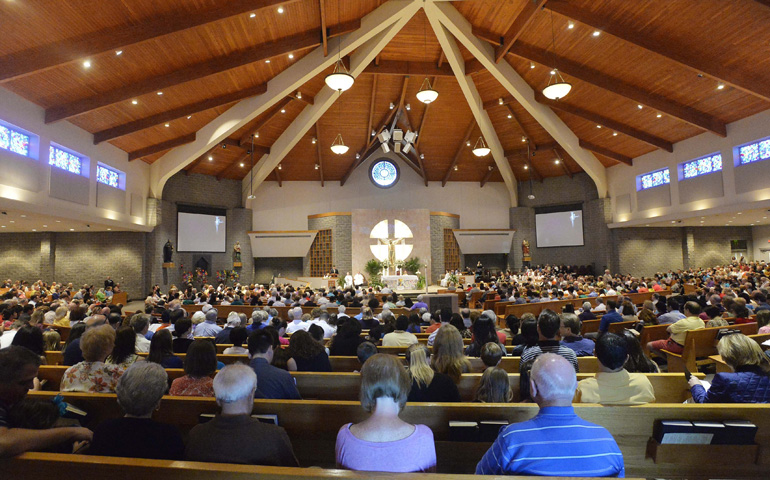 Members of the congregation at St. Matthew Catholic Church in Charlotte during the 10:45 a.m. Mass in this 2014 photo (Robert Lahser/Courtesy of The Charlotte Observer)