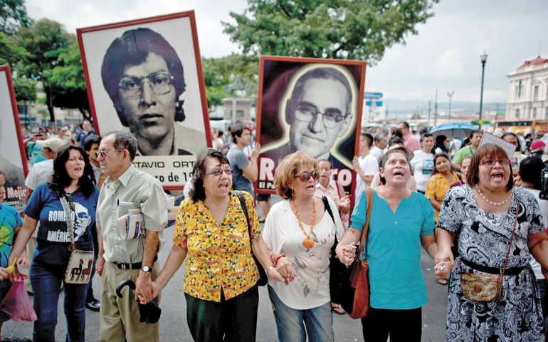 People protest the Catholic church's decision to close Tutela Legal in San Salvador, El Salvador, Oct. 6. (Getty Images/AFP/Jose Cabezas)