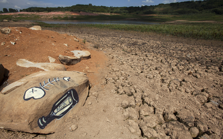 A view of the Jaguari dam in Brazil shows low water levels in early January. The drought in the region is the worst in 80 years, according to reports, as only a third of the usual rainfall occurred during the wet season from December to February. (CNS/EPA/Sebastiao Moreira)