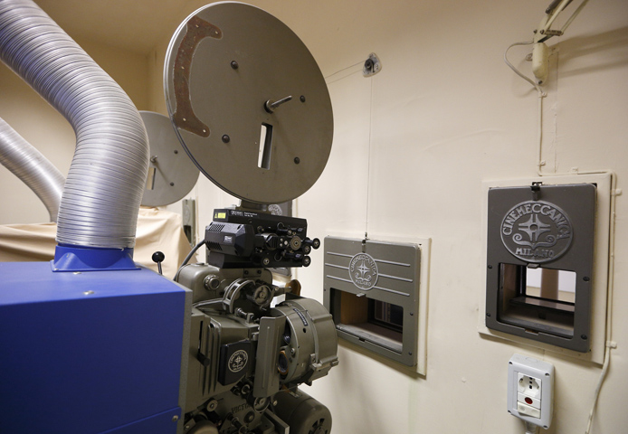 A film projector in the projection room of a small movie theater at the Vatican (CNS/Paul Haring) 