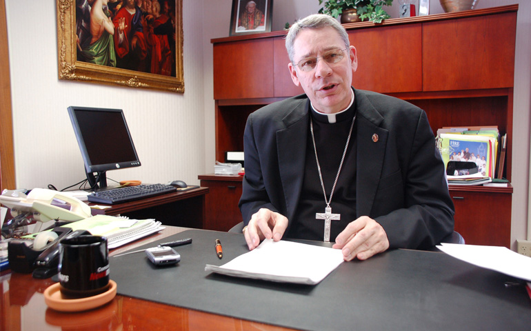 Bishop Robert Finn in his office in 2007 (CNS/Catholic Key/Kevin Kelly)