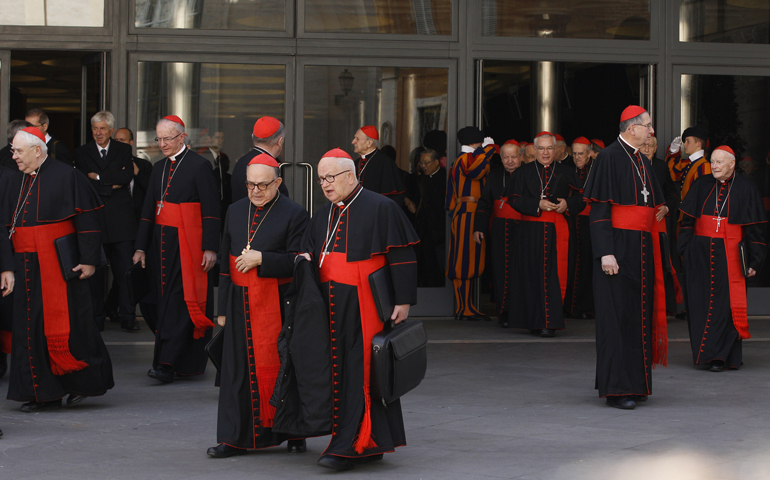 Cardinals leave a meeting with Pope Francis in the synod hall Feb. 21 at the Vatican. (CNS/Paul Haring) 