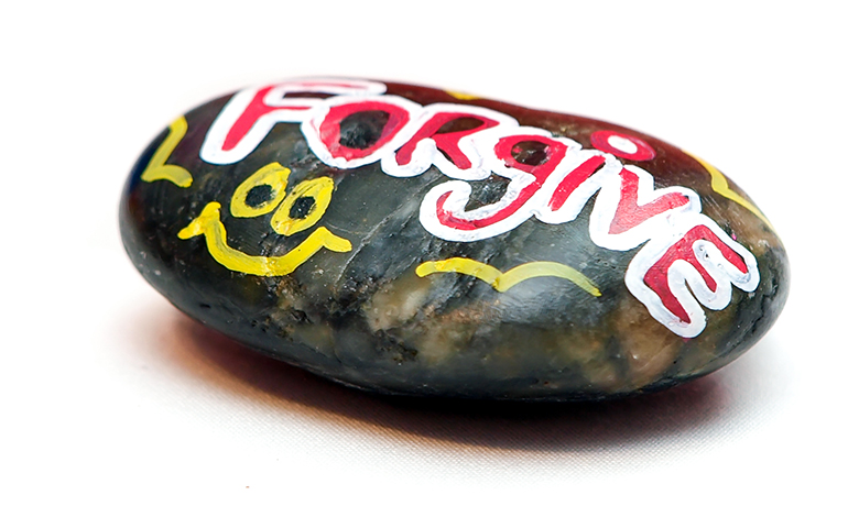 A rock that serves as a talking piece, painted by one of the youth of Precious Blood Ministry of Reconciliation (Juan Acuña)