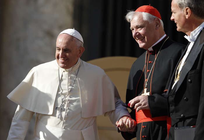 Pope Francis and Cardinal Gerhard Müller, prefect of the Congregation for the Doctrine of the Faith, during his general audience Wednesday in St. Peter's Square at the Vatican (CNS/Paul Haring)