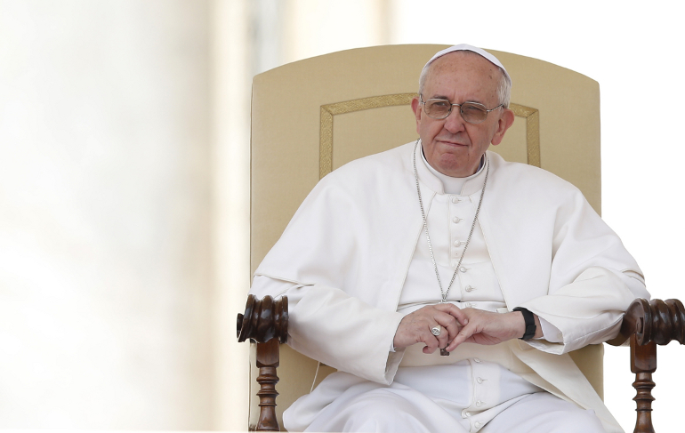 Pope Francis looks on during his general audience in St. Peter's Square at the Vatican April 17. (CNS photo/Paul Haring) 