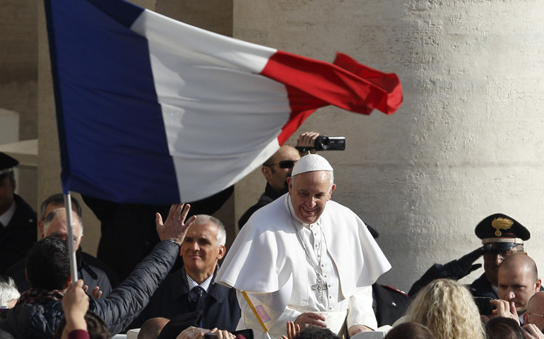 Pope Francis greets the crowd during his general audience Wednesday in St. Peter's Square at the Vatican. (CNS/Paul Haring)