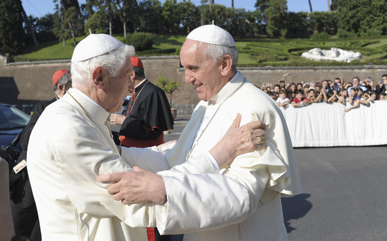 Pope Francis, right, embraces retired Pope Benedict XVI during a ceremony in the Vatican gardens Friday. (CNS/Reuters/L'Osservatore Romano)