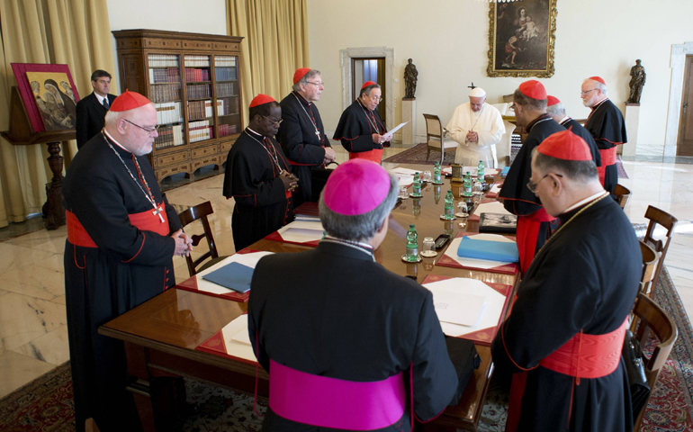 Pope Francis prays during a meeting with cardinals Tuesday at the Vatican. (CNS/Reuters/L'Osservatore Romano)