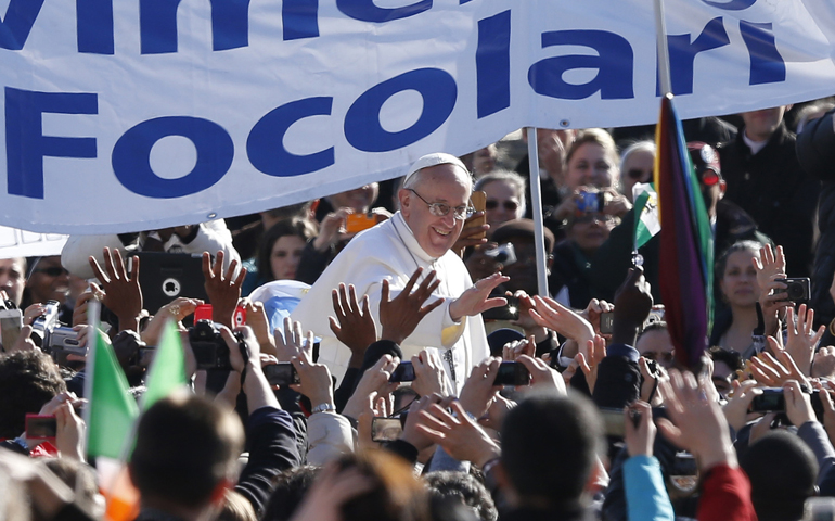 Pope Francis greets people in St. Peter's Square before celebrating his inaugural Mass March 19 at the Vatican. (CNS/Paul Haring)
