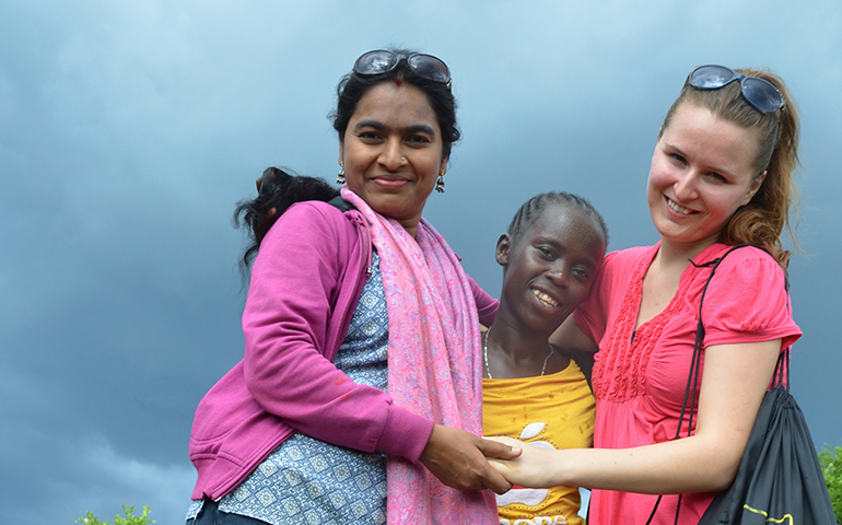 Angela Mahoney, right, with a teacher from India and an Ethiopian student