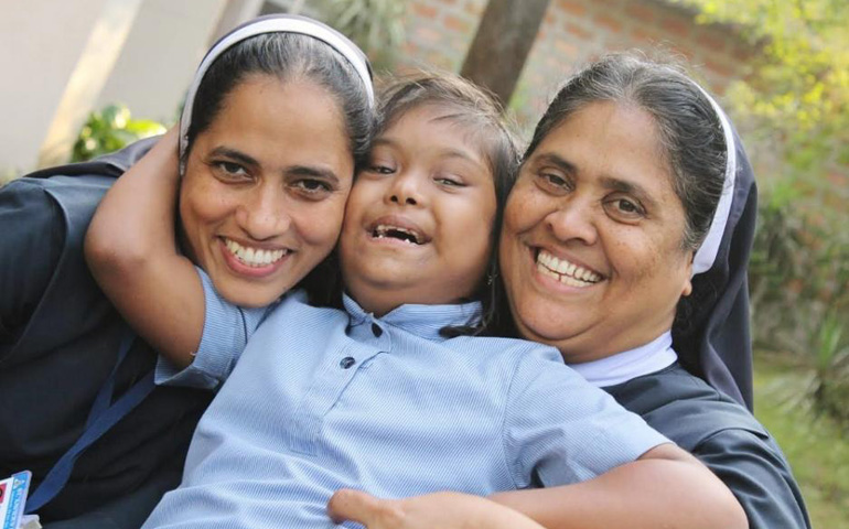 Xavier Academy Principal Sr. Monica Coelho, left, with one of the school's students and Congregation of the Holy Family Sr. Meena Dias, superior (Courtesy of Xavier Academy)