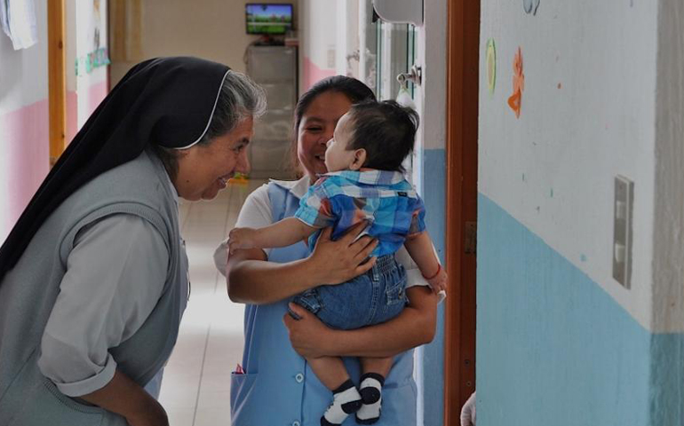 Sr. Modesta Cuma, left, is principal at Hogar Madre Anna Vitiello, an orphanage for HIV infected children in Sumpango, Guatemala. (GSR/J. Malcolm Garcia)