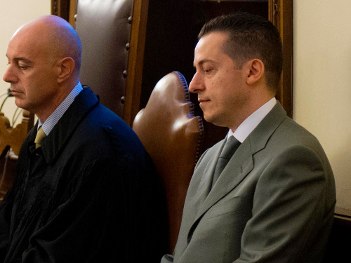 Pope Benedict XVI's former butler, Paolo Gabriele, seated in gray suit, is pictured during the opening of his trial Saturday at the Vatican. (CNS/L'Osservatore Romano)
