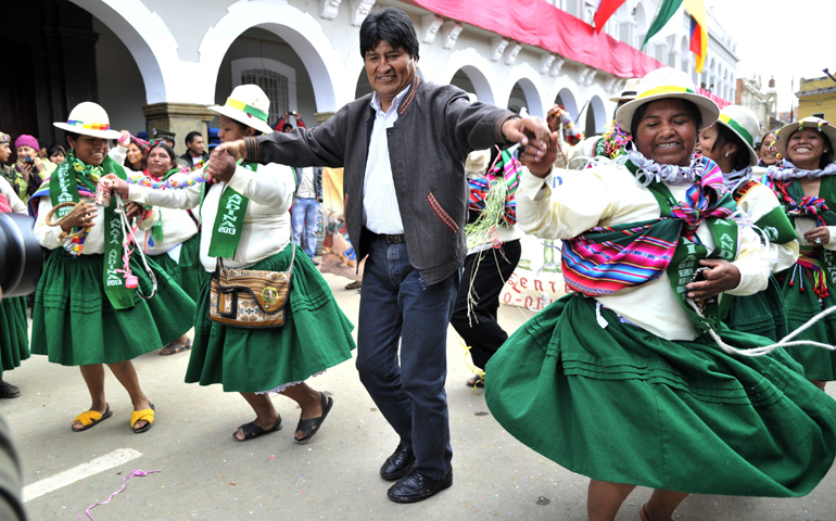Bolivian President Evo Morales dances with members of a carnival group in Oruro, Bolivia, Feb. 7. (Getty Images/AFP/Aizar Raides)