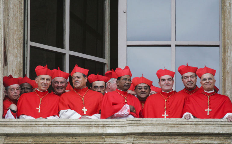 Cardinals gather on a side balcony of St. Peter's Basilica as they await the public introduction of the new pope April 19, 2005. (CNS/Nancy Wiechec)