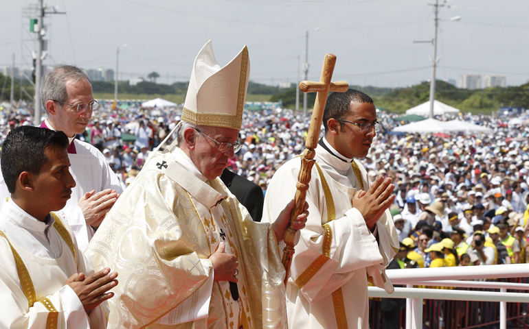 Pope Francis arrives to celebrate Mass on Monday in Los Samanes Park in Guayaquil, Ecuador. (CNS/Paul Haring)