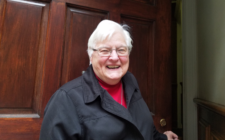 Sr. Mary Petrosky of the Franciscan Missionaries of Mary smiles outside the door of the Holy Name of Jesus Convent in Upper Manhattan. (GSR photo / Chris Herlinger)