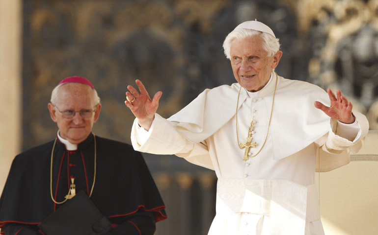 U.S. Archbishop James M. Harvey, prefect of the Papal Household, looks on as Pope Benedict XVI begins his general audience Wednesday in St. Peter's Square at the Vatican. (CNS/Paul Haring) 