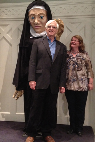 Matthew Fox and Mary Plaster, a former graduate student of Fox's, pose with Plaster's puppet likeness of Hildegard. Plaster brought the puppet to the Call to Action conference in November in Louisville, Ky. The puppet is made from bamboo, bicycle inner tubes and other recycled materials and repurposed fabric. The face and hands are made out of papier-mâché.
