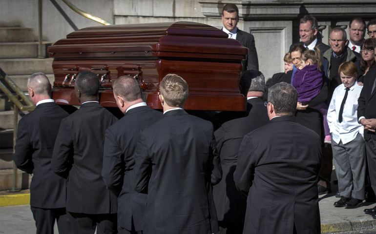 Philip Seymour Hoffman's casket arrives for his Feb. 7 funeral Mass at St. Ignatius Loyola Church in New York. (CNS/Reuters/Brendan McDermid)