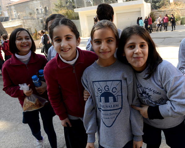 Palestinian girls play in the courtyard of Schmidt's girls school Wednesday in East Jerusalem. Bishops from North America, Europe and Africa met with students during a solidarity trip to the Holy Land. (CNS/Debbie Hill) 