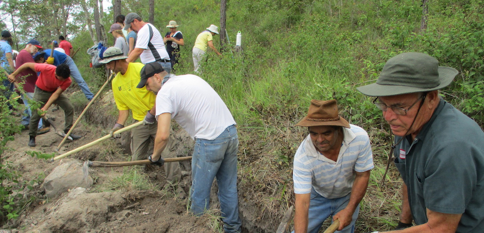 Sister Water Project volunteers install pipes to complete a 19-mile water project in the Honduran village of Mejocote, August 2018. (Courtesy of the Sisters of St. Francis of Dubuque, Iowa) Comment on text)