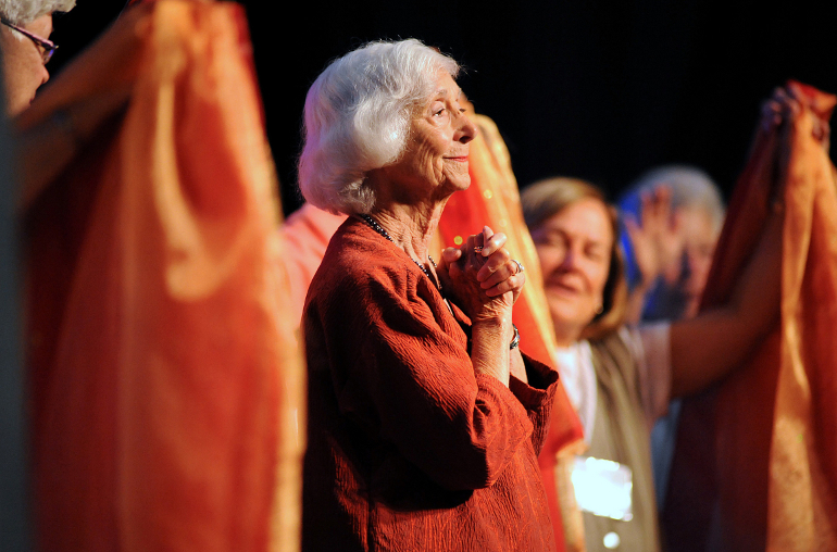 Barbara Marx Hubbard smiles Aug. 8 as she is greeted by delegates at the annual assembly of the Leadership Conference of Women Religious in St. Louis. (CNS photo/Sid Hastings)
