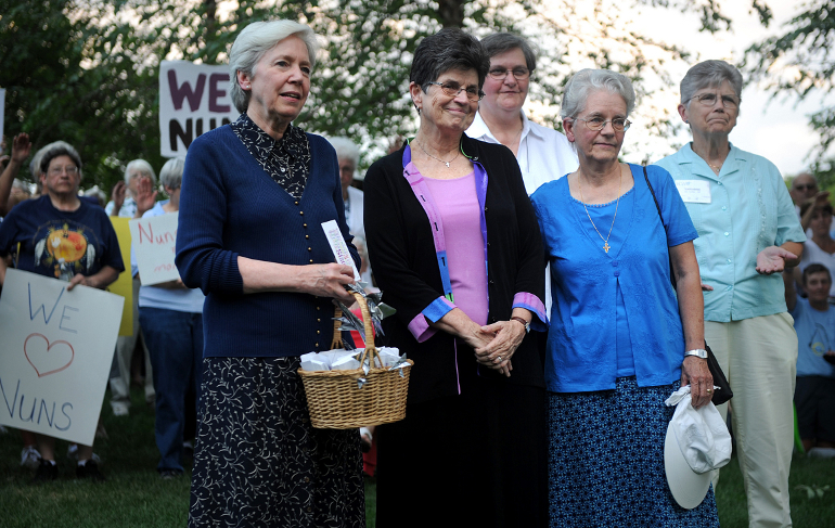 Dominican Sister Mary Hughes, past president of the Leadership Conference of Women Religious, left, Franciscan Sister Pat Farrell, LCWR president, and Franciscan Sister Florence Deacon, president-elect, Aug. 9 in St. Louis. (CNS photo/Sid Hastings)