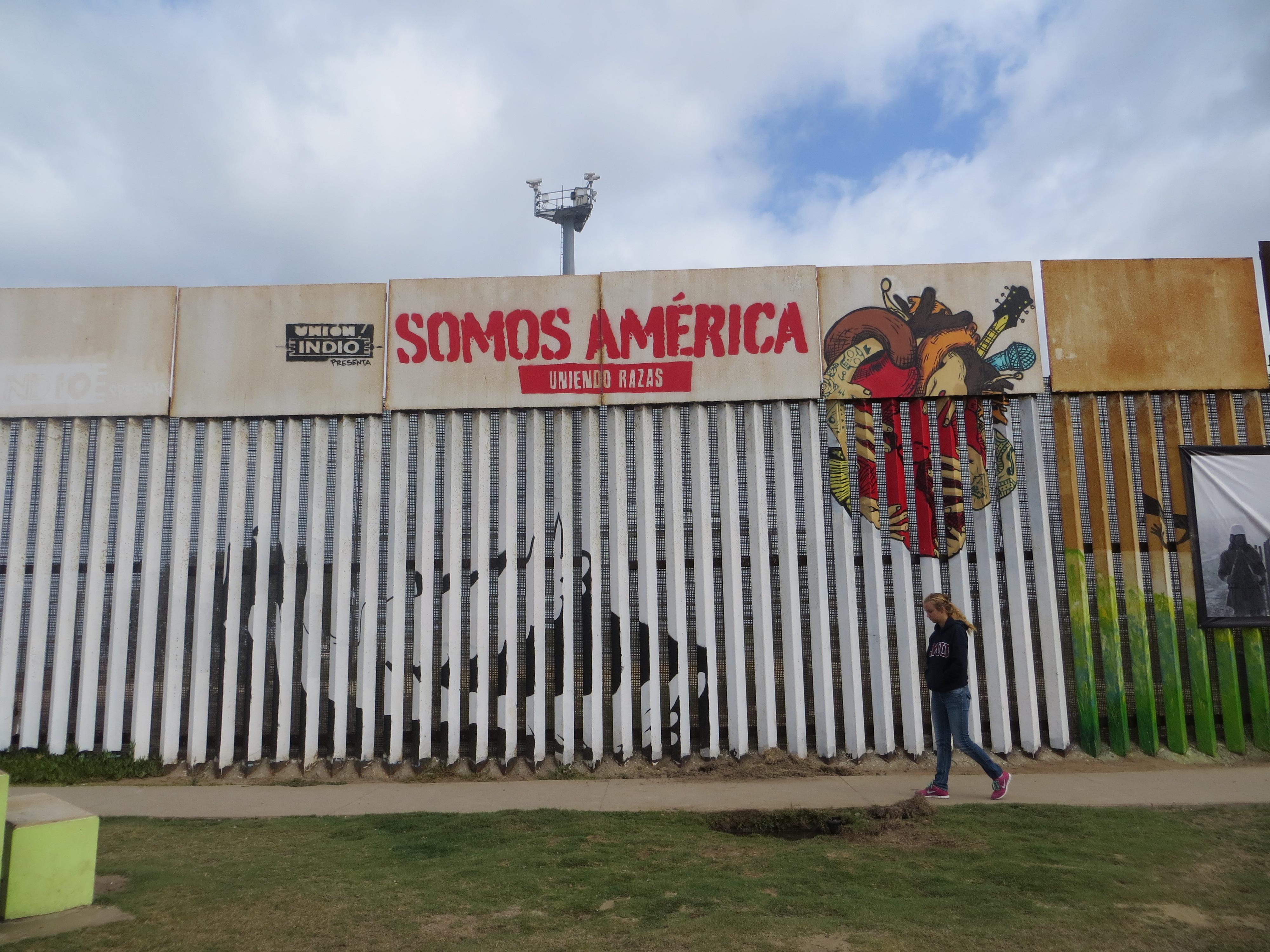 During an immersion trip in April, a Loyola Marymount University student visits Friendship Park at the border in Tijuana, Mexico (Shannon O'Brien)