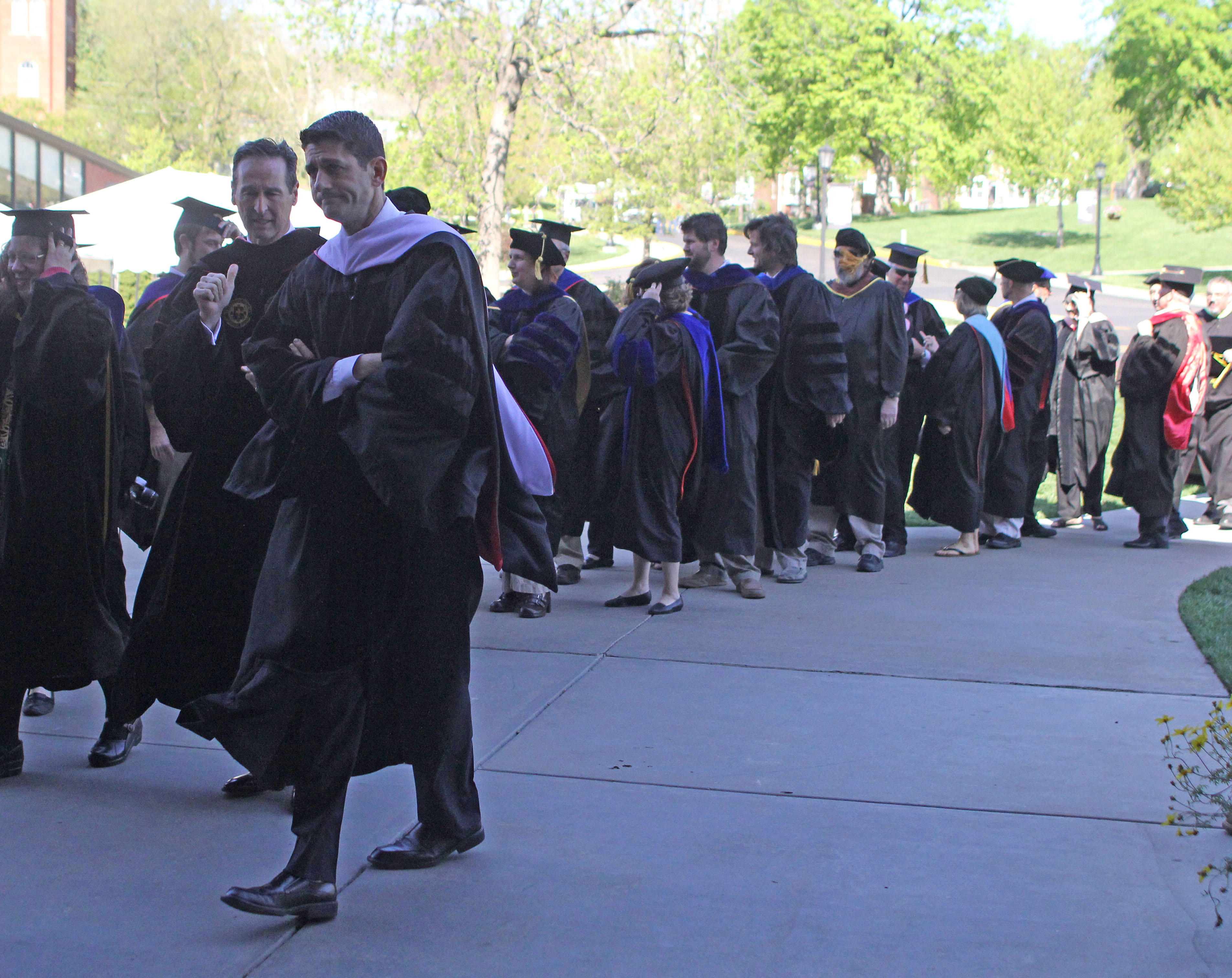 Rep. Paul Ryan processes with Benedictine College President Stephen Minnis and other professors during the college’s graduation ceremony Saturday, May 11. Ryan delivered the commencement address during the commencement exercises. (NCR photo/Eloísa Pérez-Lozano)