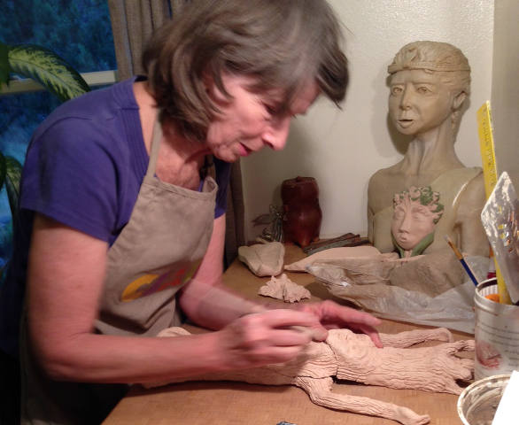 Mariam Weidner works on finishing touches of her Praying Tree Sculpture. (Photos courtesy Mariam Weidner)
