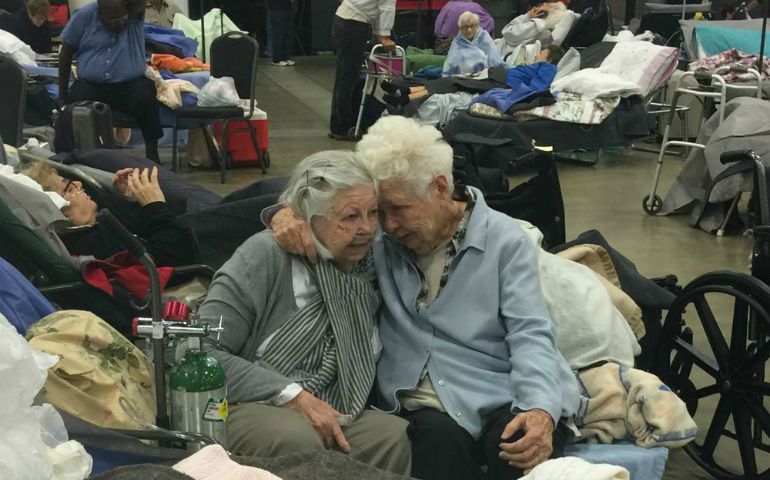 Adrian Dominican Sr. Grace Flowers, right, hugs a woman at their shelter at the Palm Beach County Special Needs Center in West Palm Beach, Florida, during Hurricane Irma. (Courtesy of Sr. Grace Flowers)