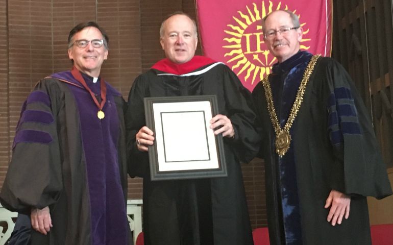 Jesuit Fr. Kevin O'Brien, dean of the Jesuit School of Theology of Santa Clara University, left, poses with Bishop Robert McElroy and Jesuit Fr. Michael Engh, president of Santa Clara University at the May 20th commencement. (Courtesy of Jesuit School of Theology at Santa Clara University/Steven Padilla)