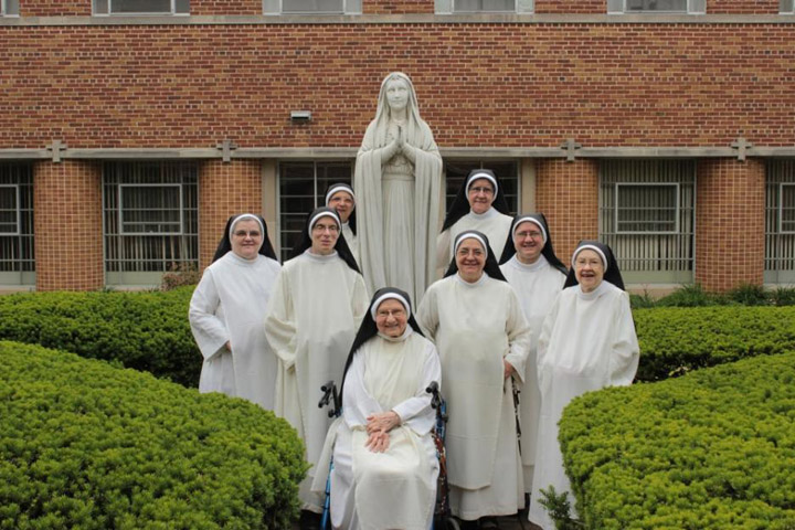 Eight of the nine nuns who are part of the Cloistered Dominican Nuns of the Perpetual Rosary in Lancaster, Penn. (GSR photo / Colin Evans)