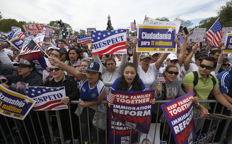 Hundreds of protesters calling for comprehensive immigration reform gather at a rally Tuesday on the National Mall in Washington. (CNS/Reuters/Jason Reed)