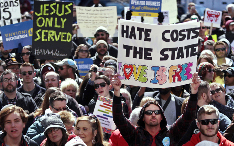 Demonstrators rally March 28 at Monument Circle in Indianapolis to protest a religious freedom bill signed in to law by Indiana Gov. Mike Pence. (CNS/Reuters/Nate Chute)