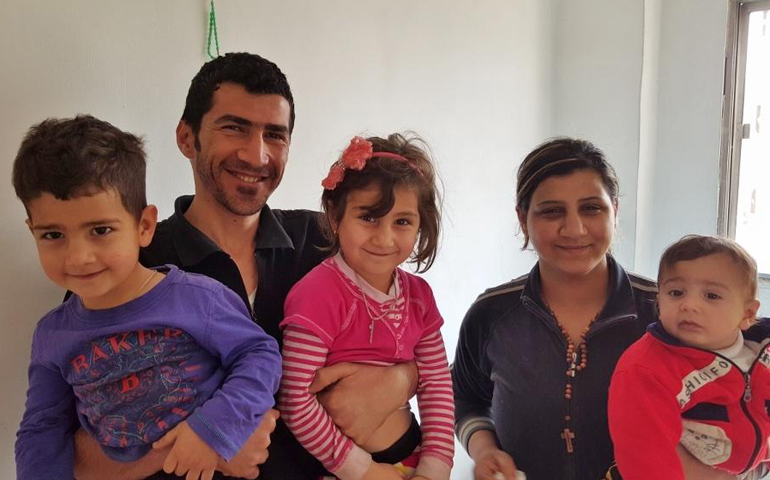 Iraqi refugees Sabhan Jinan Maqadas Hasso and Lina Safaa Najeeb Alkes Asahq and their three children in the Al-Hashni neighborhood of Amman, Jordan. Out of necessity, they say, Easter will be simple this year. (GSR/Chris Herlinger)