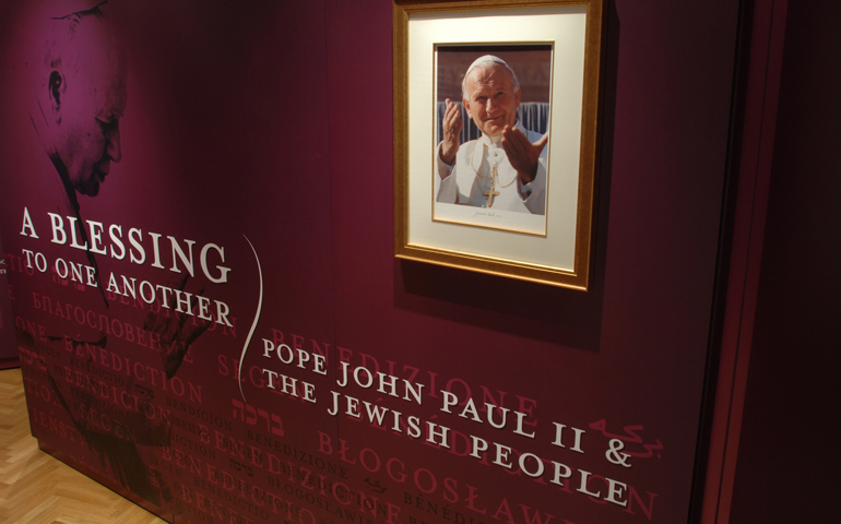 The opening panel of the exhibit "A Blessing to One Another: Pope John Paul II and the Jewish People" in the Vatican's Braccio di Carlo Magno hall (CNS/Courtesy of Blessing Exhibit)
