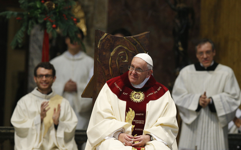 Pope Francis smiles during a Jan. 3 Mass at the Church of the Gesu in Rome. The Mass was celebrated on the feast of the Most Holy Name of Jesus in thanksgiving for the canonization of Jesuit St. Peter Faber. (CNS/Paul Haring)