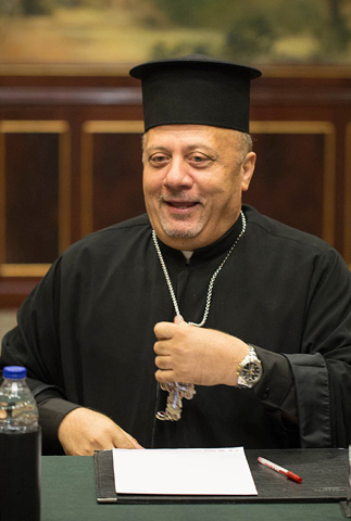 Fr. Nabil Haddad, director of the Jordanian Interfaith Coexistence Research Center, speaks about the Syrian crisis and a wide range of regional concerns Wednesday to an ecumenical group of Christian writers and bloggers from the U.S. at a hotel in Amman. (CNS/Tom Tracy) 