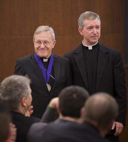 German Cardinal Walter Kasper wears the 2014 Johannes Quasten Award medallion on a purple ribbon. (CNS/Tyler Orsburn) 