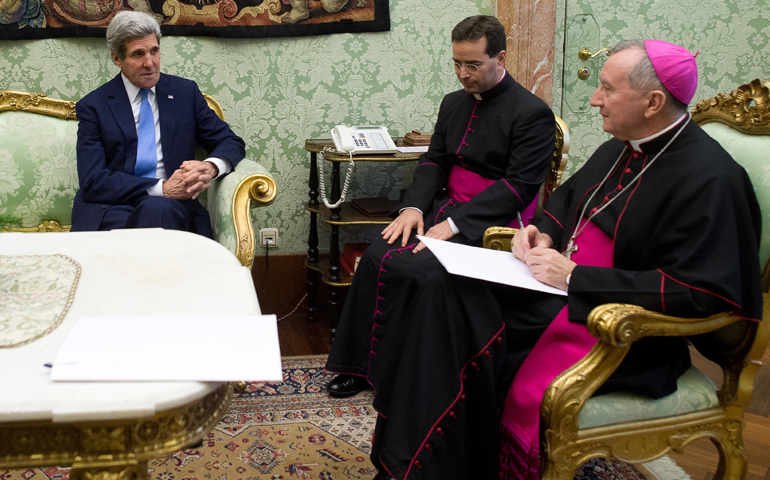 Cardinal-designate Pietro Parolin, Vatican secretary of state, right, meets with U.S. Secretary of State John Kerry on Tuesday at the Vatican. (CNS/L'Osservatore Romano)