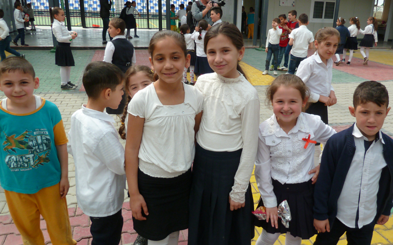 Internally displaced Iraqi school children during recess at Al Bishara School (Annunciation School), run by the Dominican Sisters and located in the City of Ankawa on the outskirts of Erbil, Iraq.