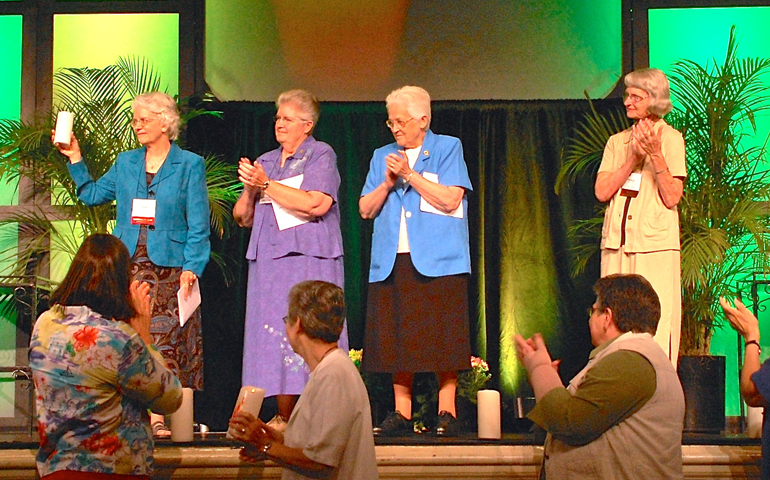 From left: Franciscan Sr. Florence Deacon, outgoing past president of LCWR; St. Joseph Sr. Carol Zinn, who moved from president to past president Friday; Immaculate Heart of Mary Sr. Sharon Holland, who moved from president-elect to president; and St. Joseph Sr. Marcia Allen, who became the group’s president-elect. (Dan Stockman)