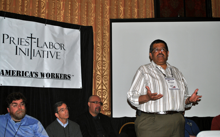Fr. Richard Vega of Los Angeles, right, shares his experiences as a labor priest at the second meeting of the Priest-Labor Initiative, held April 22, in Reno, Nev. (NCR photo/Brian Roewe)